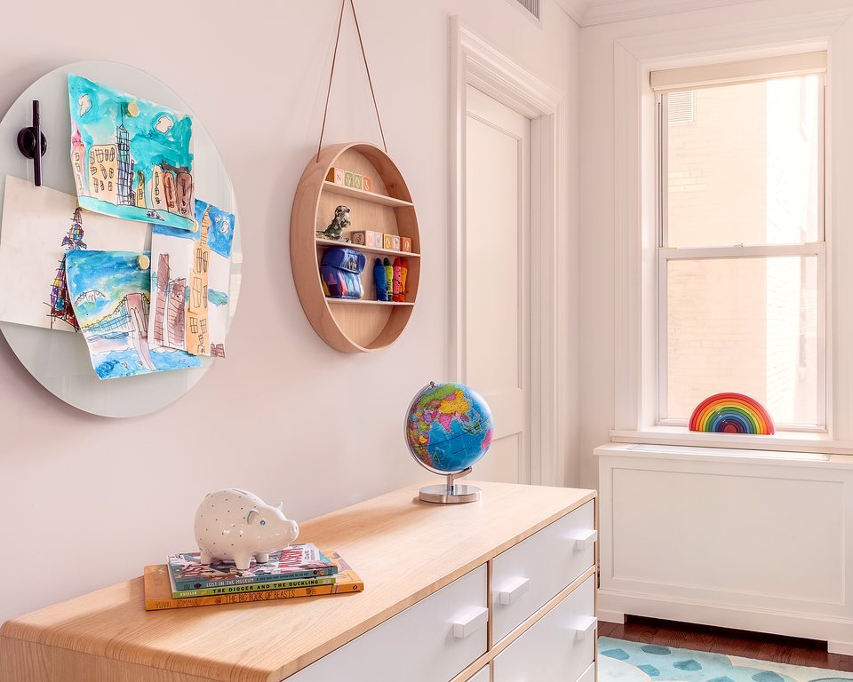 Kids room overview with characterful, layered decor